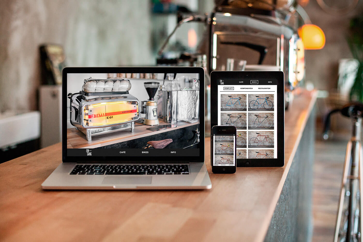 Photo of the responsive website design for Café Eingang shown on a mobile, tablet and desktop screen.